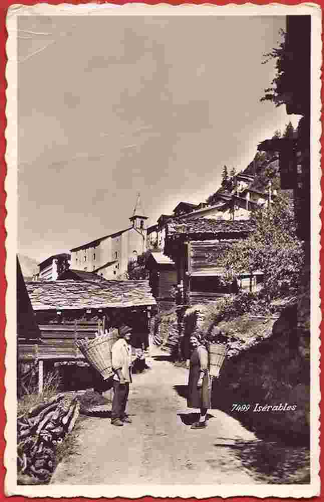 Isérables. Couple de paysans avec hotte, 1961