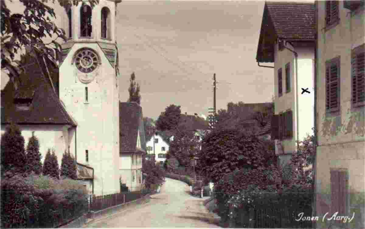 Jonen. Panorama von Kirche mit Uhr